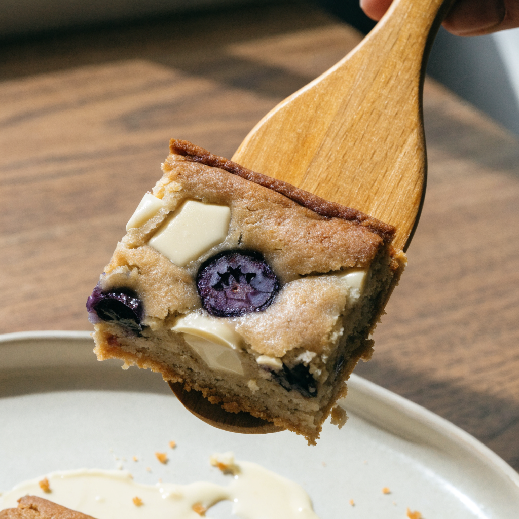 Close-up of chewy blueberry white chocolate blondies