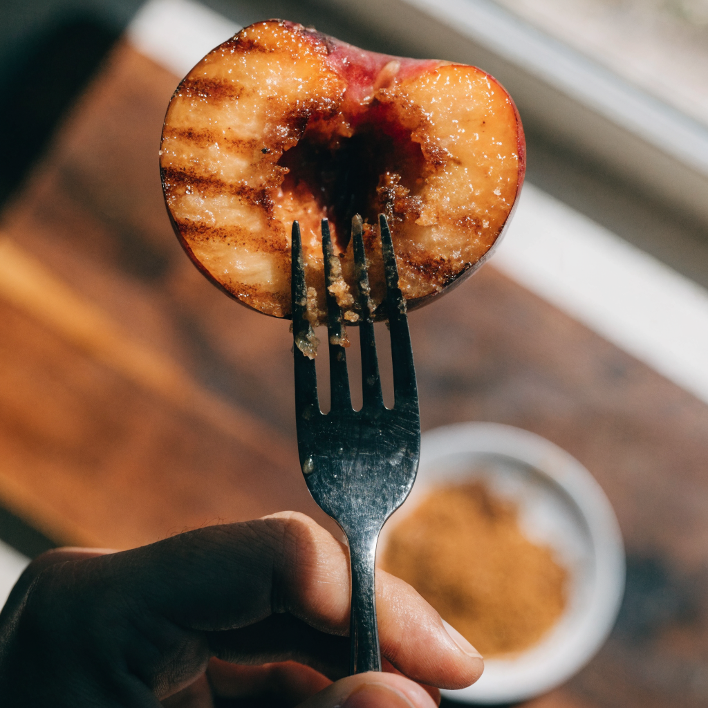 Close-up of simple grilled peaches with cinnamon and brown sugar